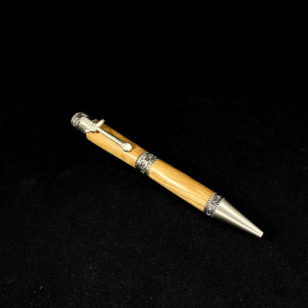 The Cowboy Antique Pewter Pen Paired with Jack Daniel's No. 7 Whiskey(R) Distillery Charred Tiger Oak Whiskey Barrel Wood.