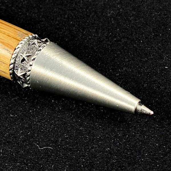 The Cowboy Antique Pewter Pen Paired with Jack Daniel's No. 7 Whiskey(R) Distillery Charred Tiger Oak Whiskey Barrel Wood.